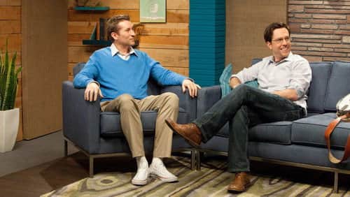Ed Helms Wears a Grey Shirt & Brown Boots