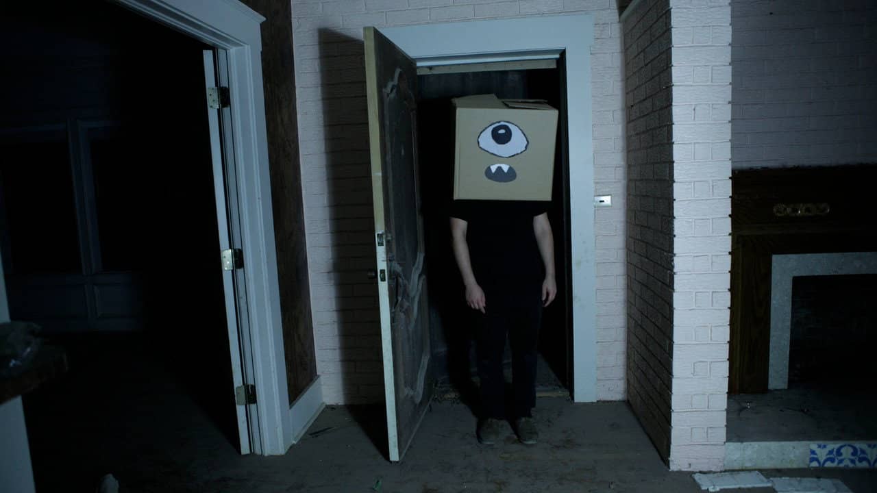 A Ghost and the Boy with a Box on His Head backdrop