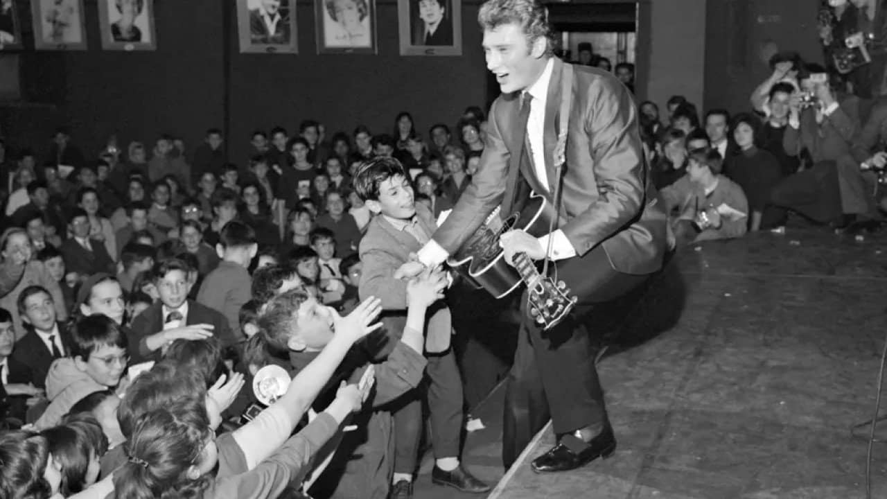 Johnny Hallyday - Un soir à l'Olympia backdrop