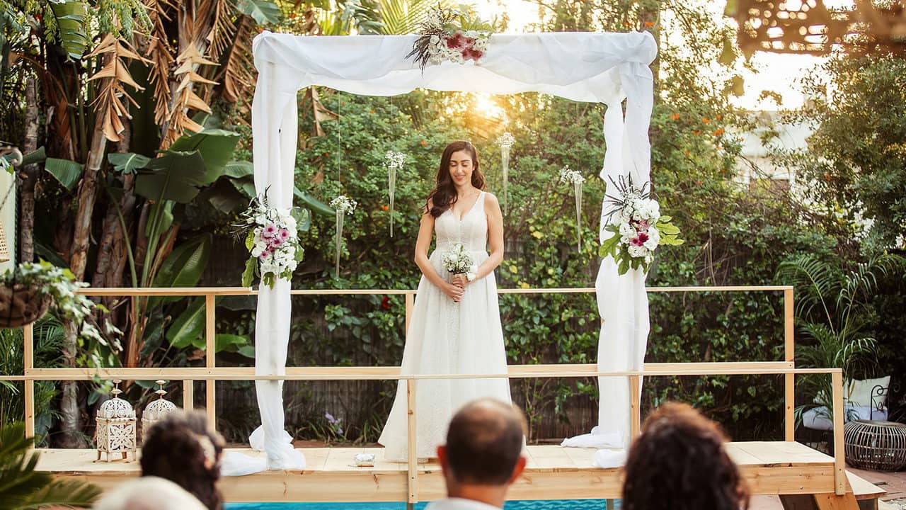Marrying Myself backdrop