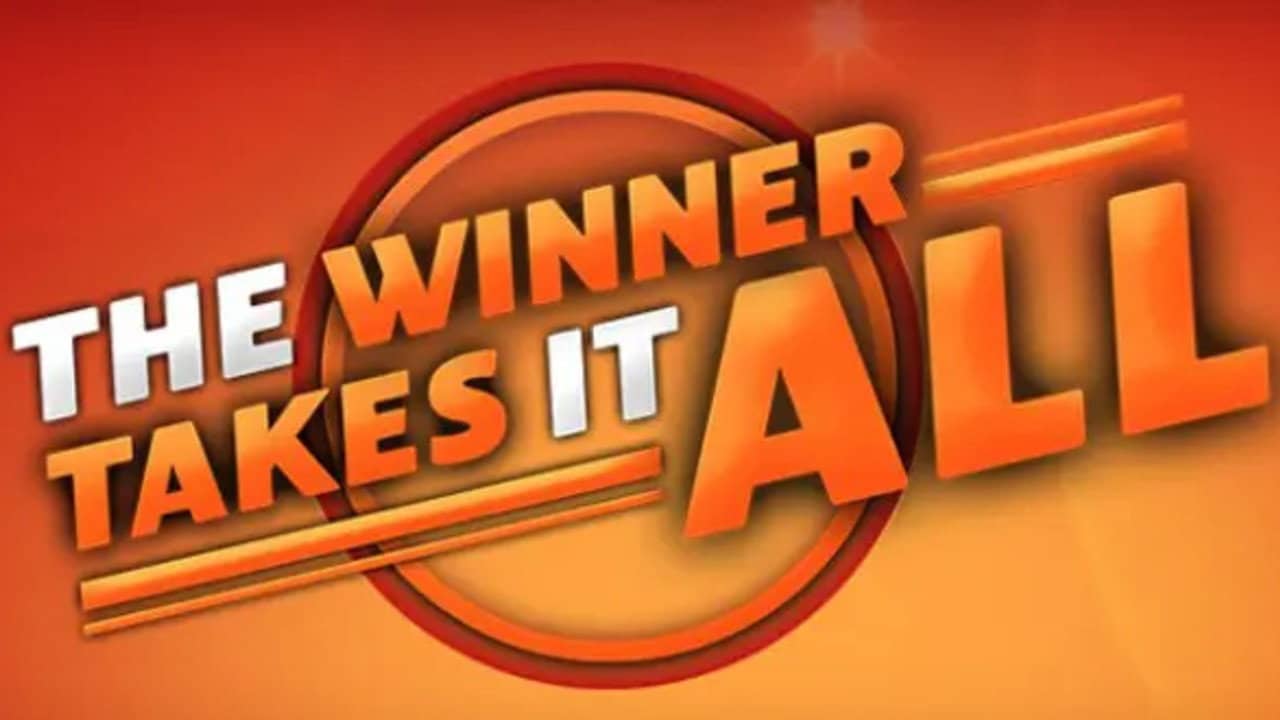 The Winner Takes It All backdrop