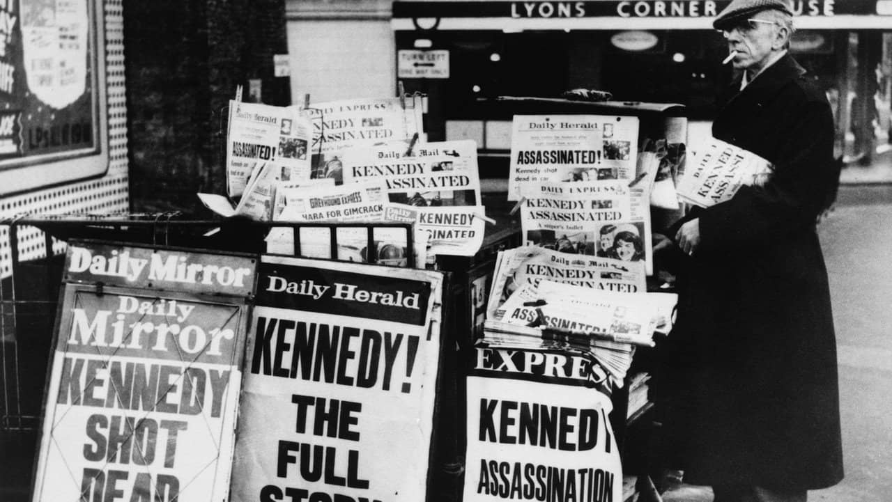 JFK: Breaking the News backdrop