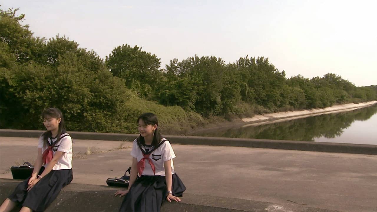 The Woman Opposite backdrop