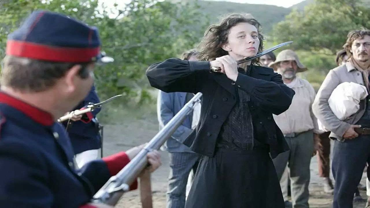 The Rebel, Louise Michel backdrop