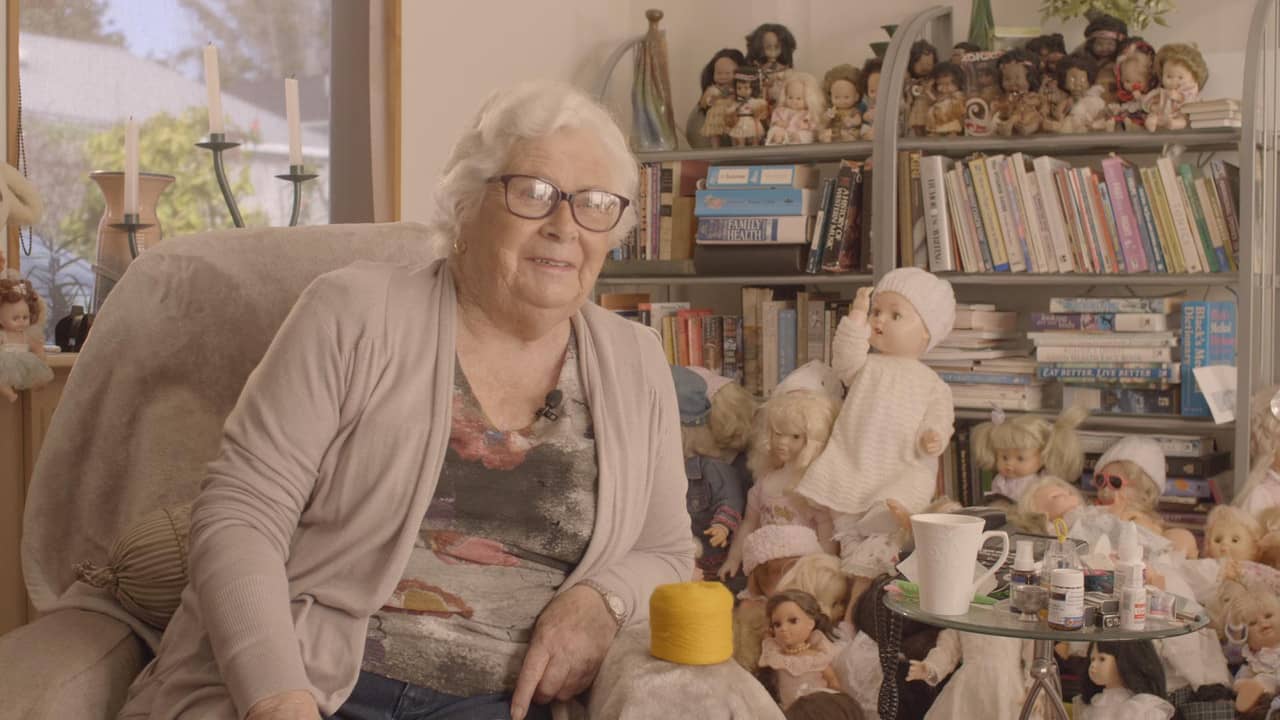 Edith Gibson has 3000 Dolls backdrop