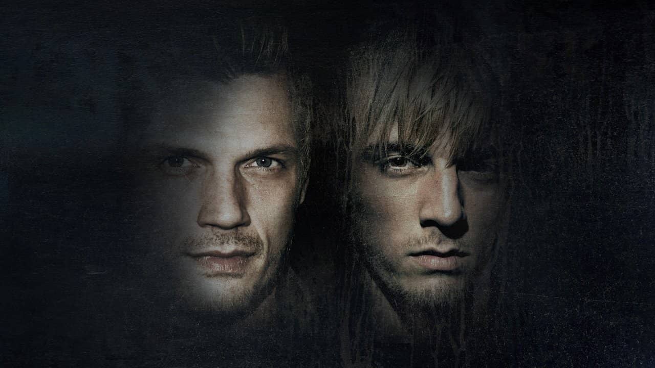 Fallen Idols: Nick and Aaron Carter backdrop