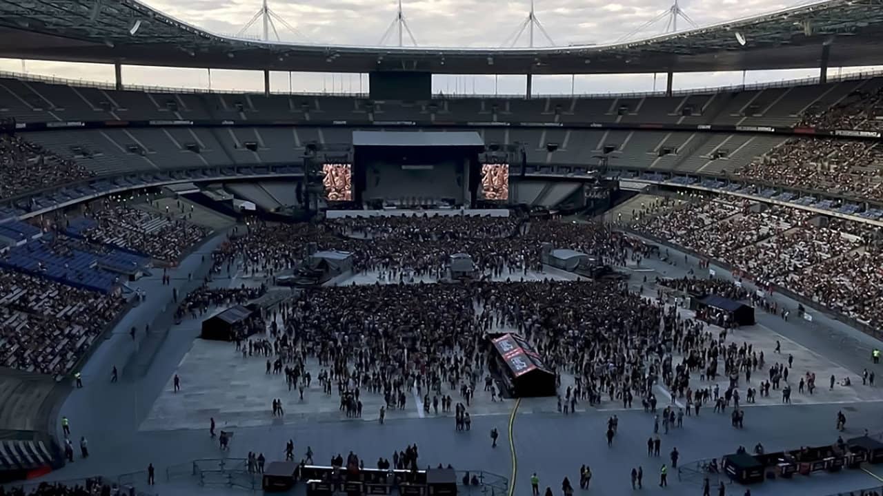 Johnny Hallyday Allume le feu au Stade de France backdrop