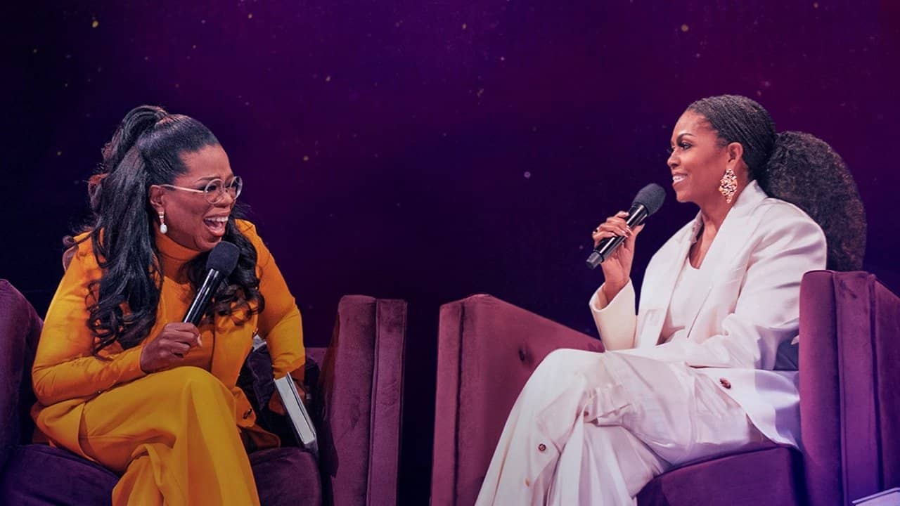 The Light We Carry: Michelle Obama and Oprah Winfrey backdrop