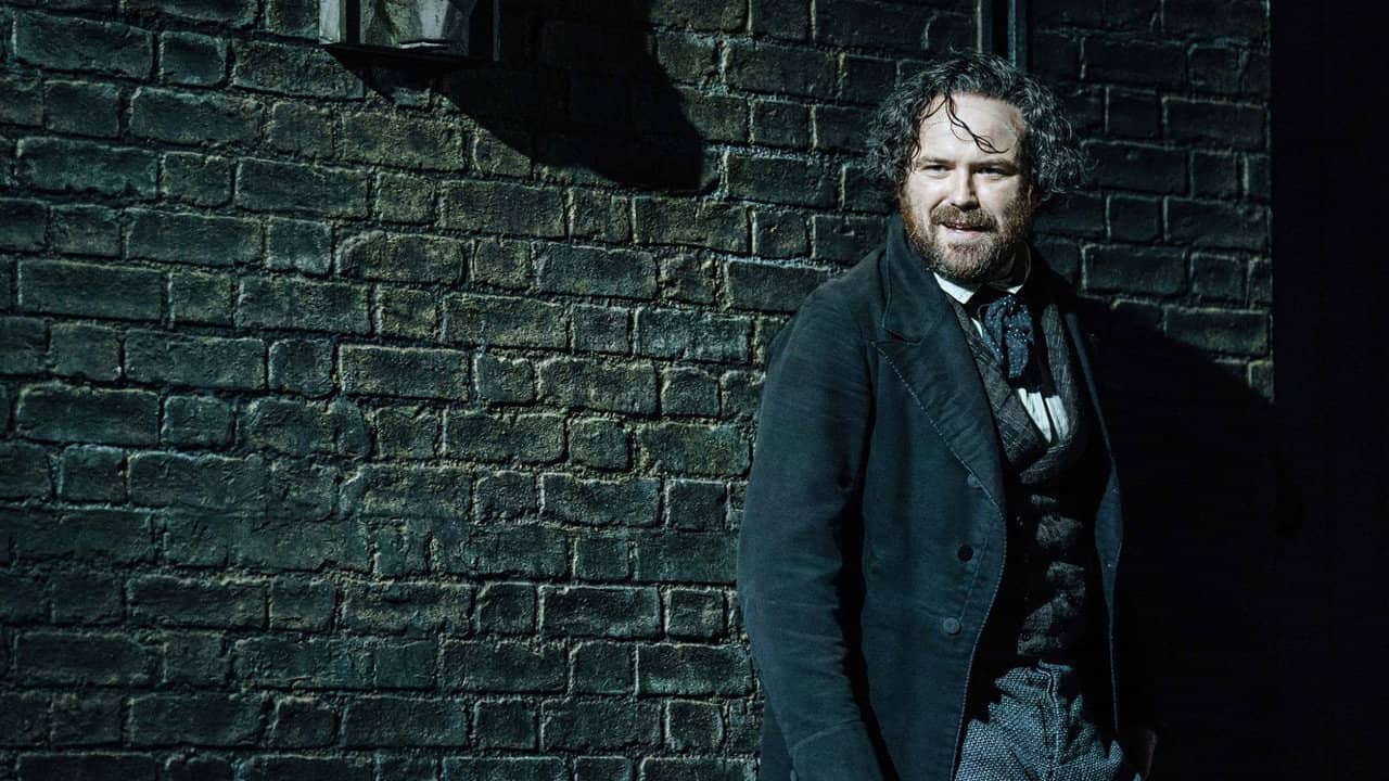 National Theatre Live: Young Marx backdrop