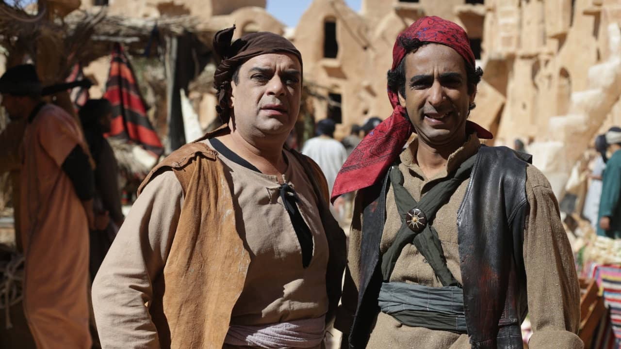 طفاش والأربعين حرامي backdrop