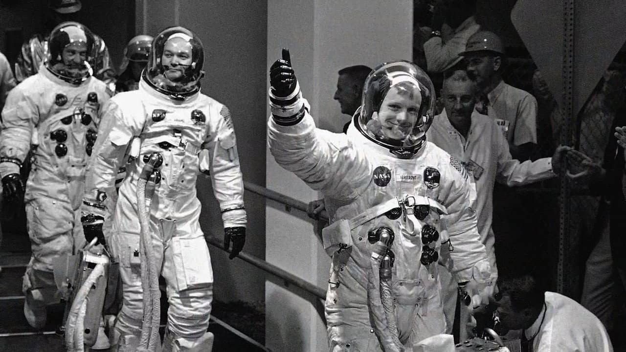 Man on the Moon with Walter Cronkite backdrop