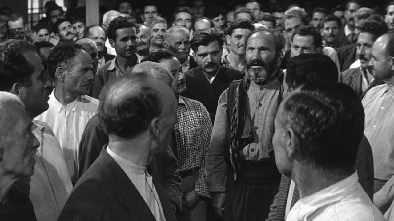 He Who Must Die backdrop