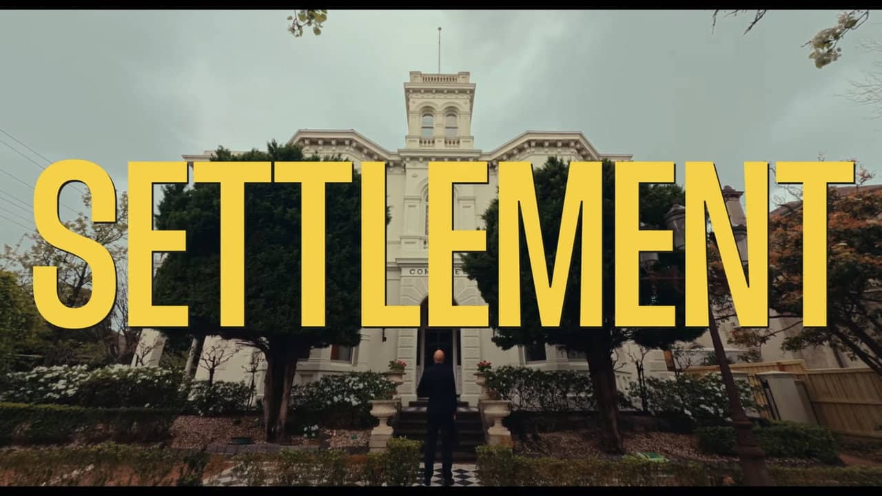 Settlement backdrop