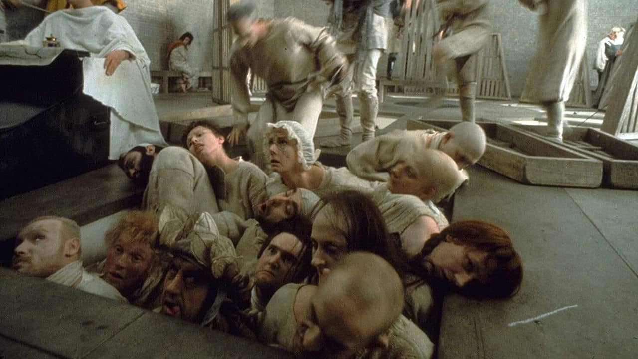 The Persecution and Assassination of Jean-Paul Marat as Performed by the Inmates of the Asylum of Charenton Under the Direction of the Marquis de Sade backdrop