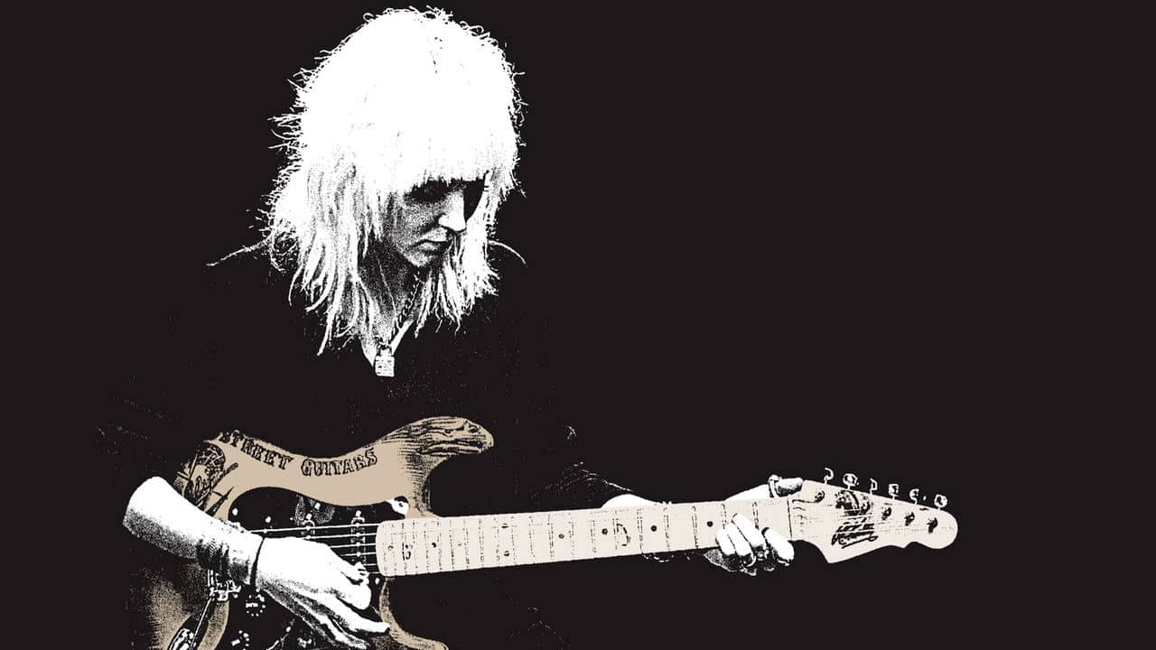 Carmine Street Guitars backdrop