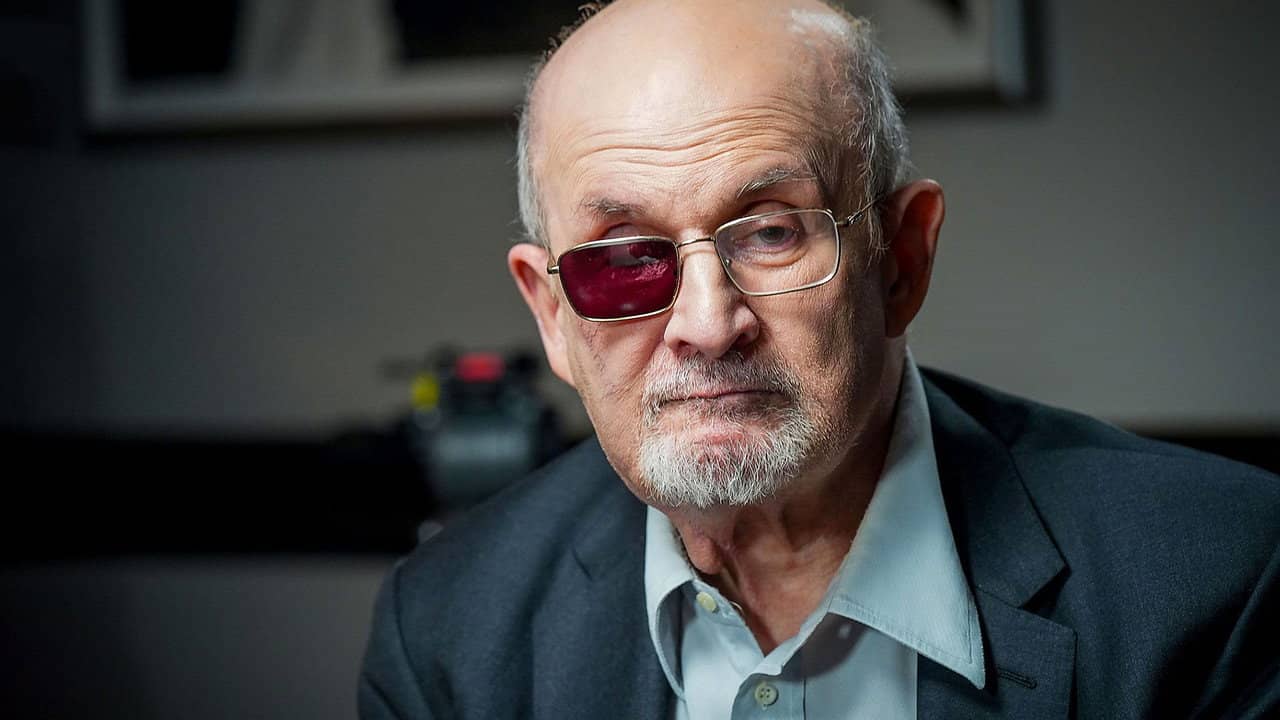Salman Rushdie: Through a Glass Darkly backdrop