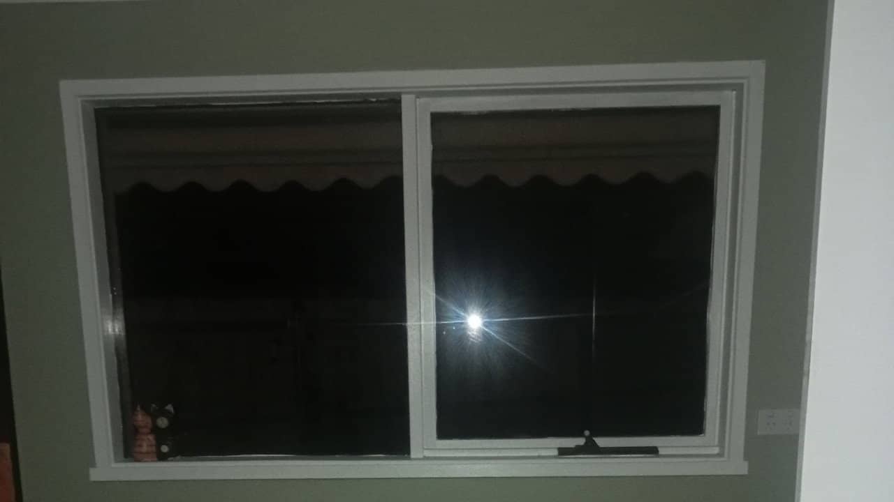The man in the window backdrop